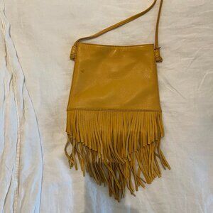 Cute HOBO purse with funky fringe.